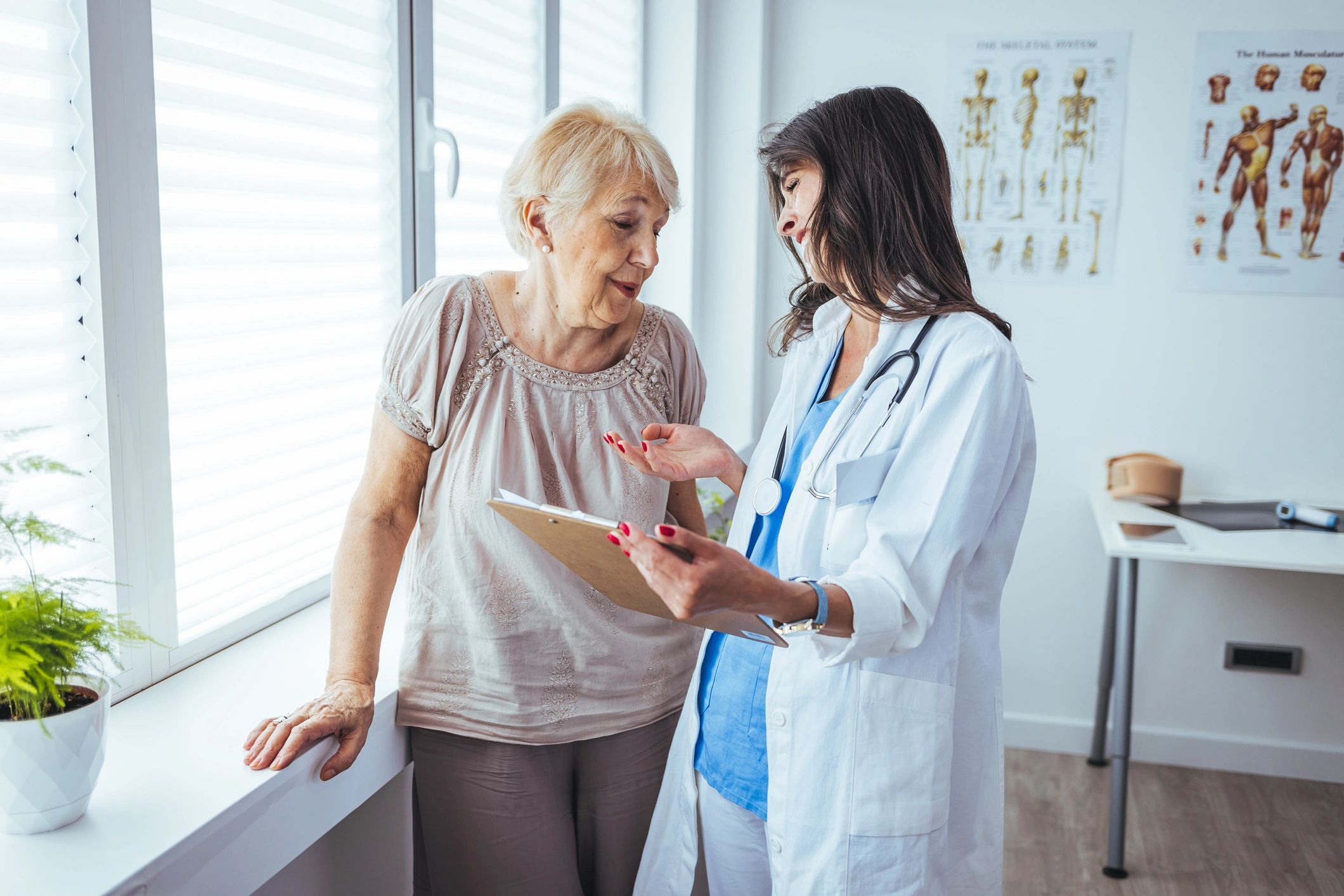 Patient speaking with doctor about treatment planning