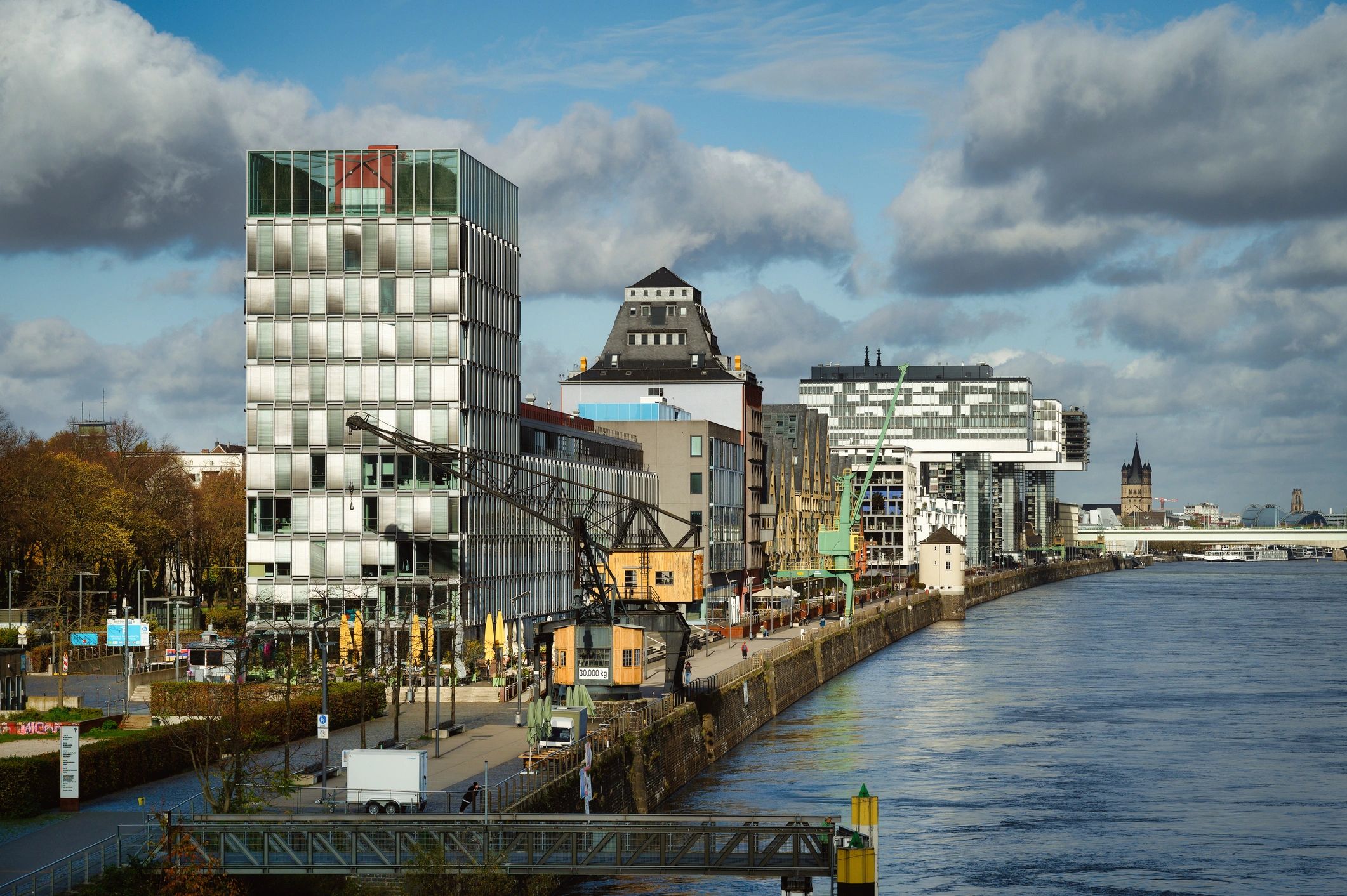 Modern German waterfront architecture suggesting future destination expansion